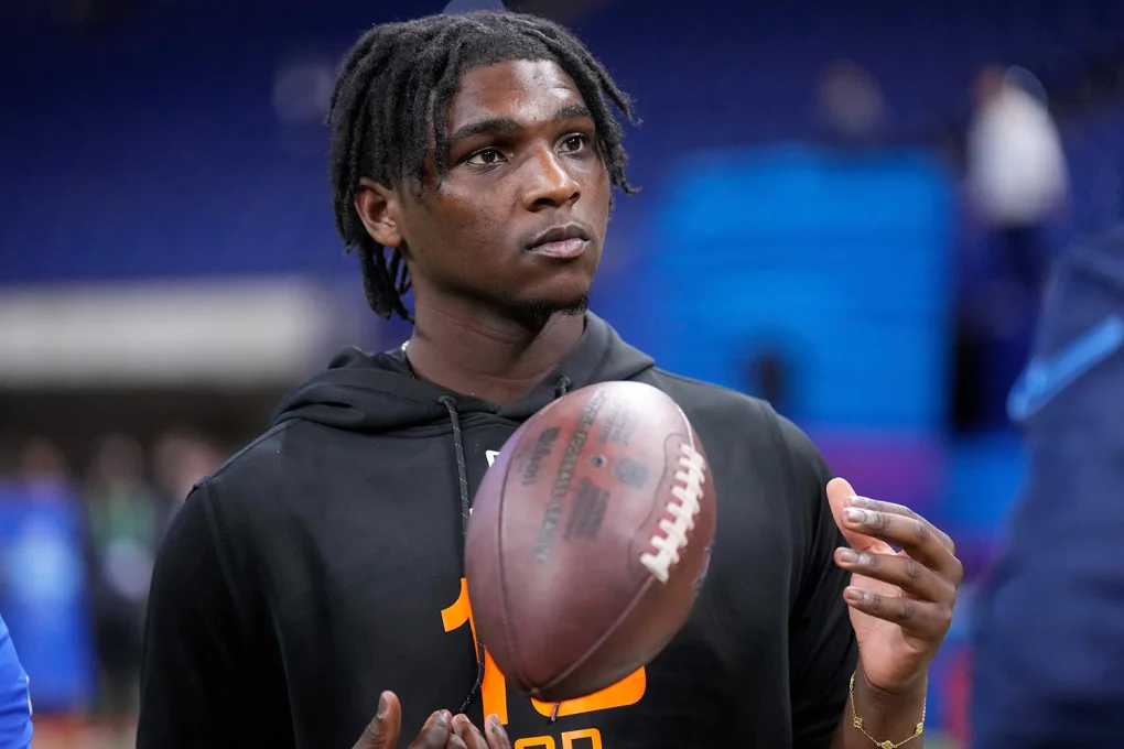 Miami quarterback Cam Ward watches a drill at the NFL football scouting combine in Indianapolis, Saturday, March 1, 2025. (AP Photo/George Walker IV)