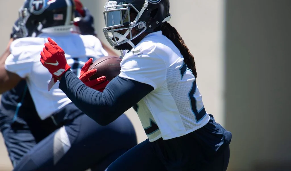 Derrick Henry runs at Tennessee Titans practice in Nashville.