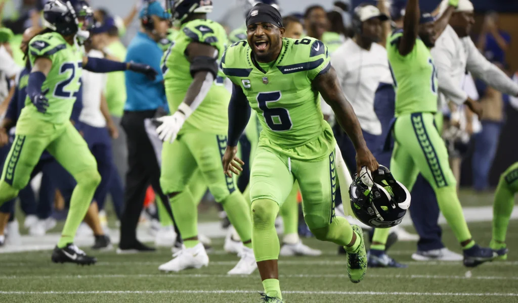 Sep 12, 2022; Seattle, Washington, USA; Seattle Seahawks safety Quandre Diggs (6) celebrates following a missed field goal against the Denver Broncos during the fourth quarter at Lumen Field. Mandatory Credit: Joe Nicholson-USA TODAY Sports