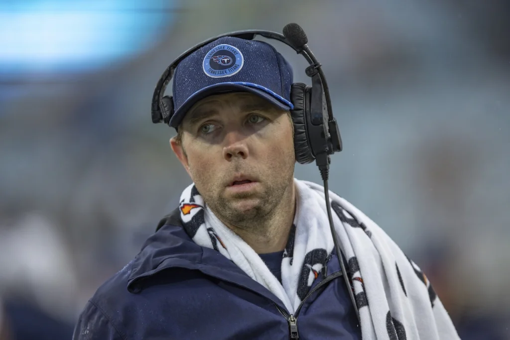 Tennessee Titans quarterbacks coach Bo Hardegree walks the sideline before facing the Jacksonville Jaguars, in an NFL football game in Jacksonville, Fla., Sunday, Dec. 29, 2024. The Jaguars defeated the Titans 20-13. (AP Photo/Gary McCullough)