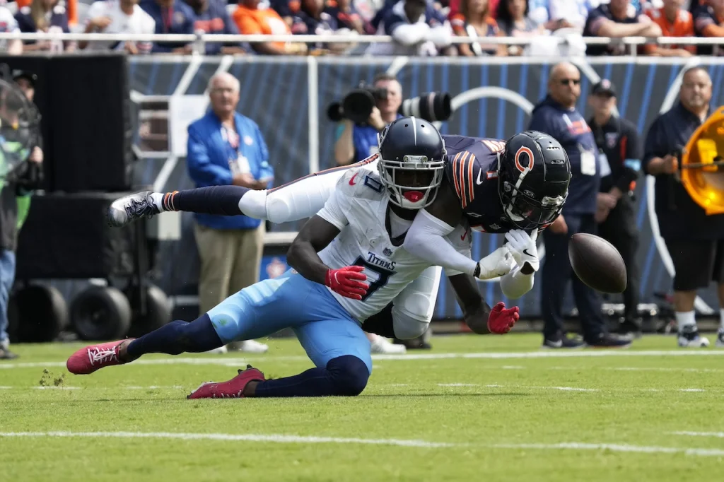 Chicago Bears cornerback Jaylon Johnson, right, breaks up a pass intended for Tennessee Titans wide receiver Calvin Ridley during the first half of an NFL football game Sunday, Sept. 8, 2024, in Chicago. (AP Photo/Nam Y. Huh)