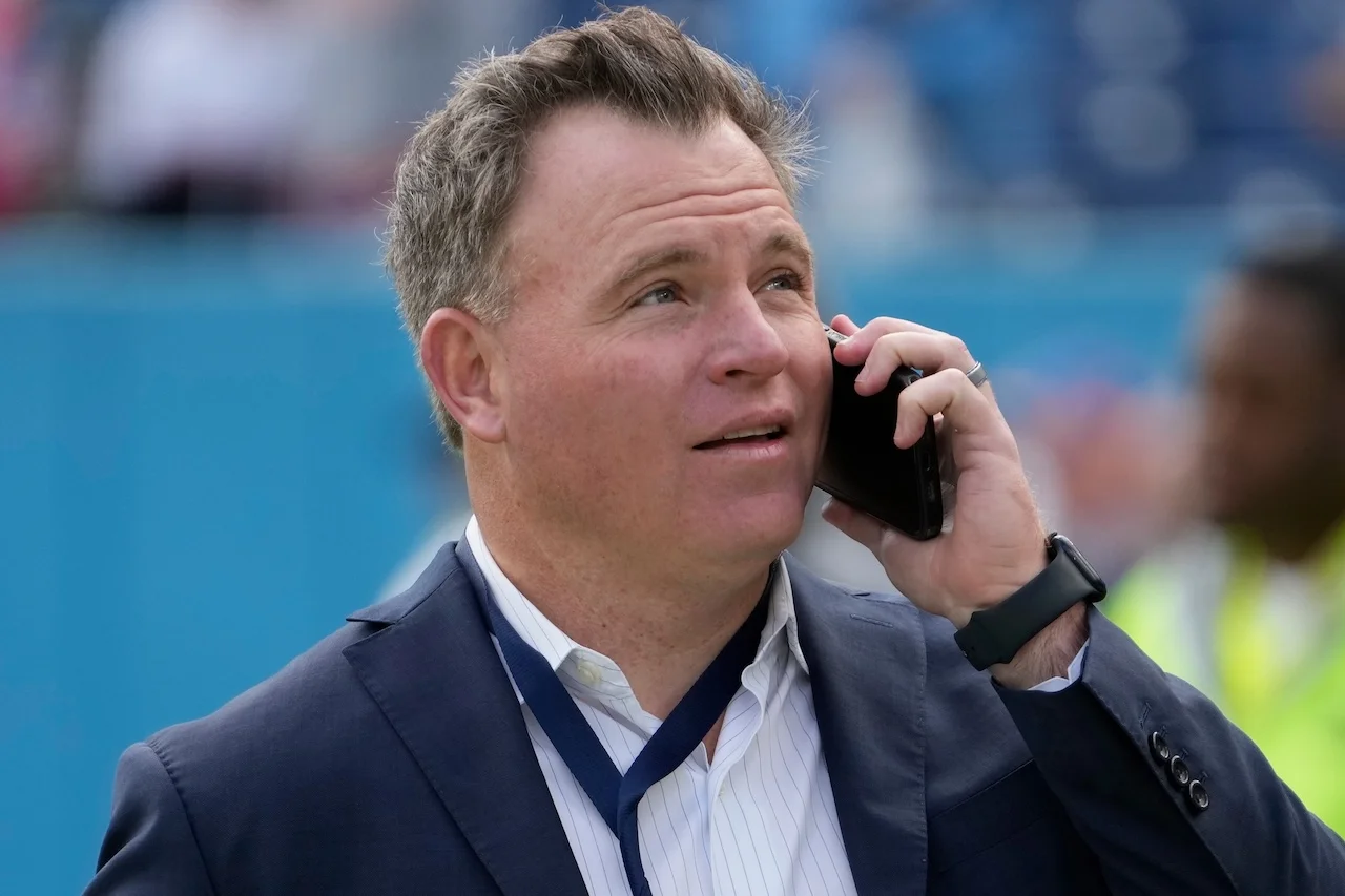 Tennessee Titans general manager Mike Borgonzi visits at the field before an NFL football game against the New England Patriots, Sunday, Oct. 19, 2025, in Nashville, Tenn. (AP Photo/George Walker IV)