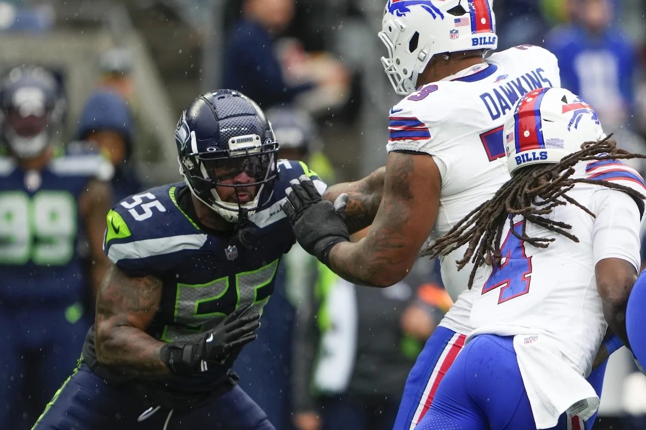 Seattle Seahawks defensive end Dre'Mont Jones (55) in action against Buffalo Bills offensive tackle Dion Dawkins (73) during an NFL football game, Sunday, Oct. 27, 2024, in Seattle. (AP Photo/Lindsey Wasson)