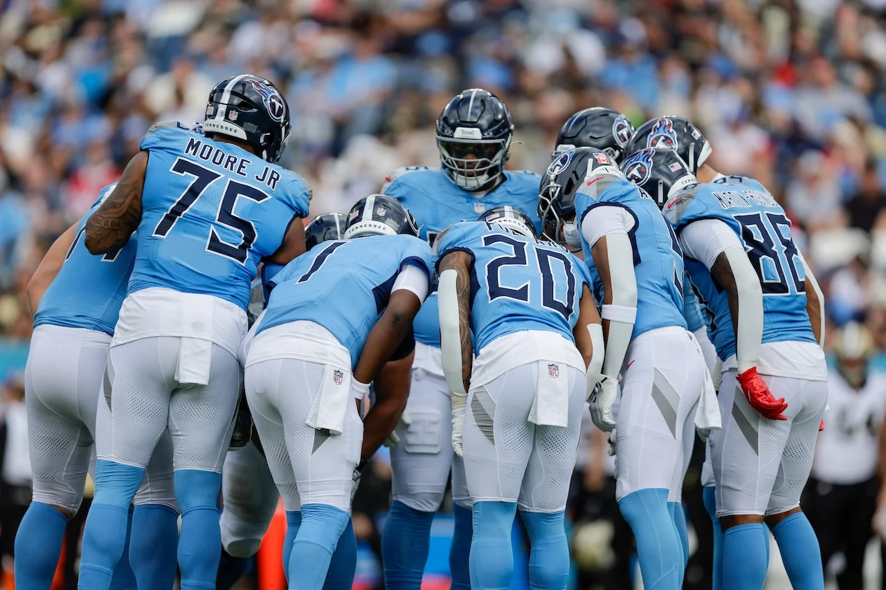Tennessee Titans offense huddles up during the first half of an NFL football game against the New Orleans Saints, Sunday, Dec. 28, 2025, in Nashville, Tenn. (AP Photo/Stew Milne)