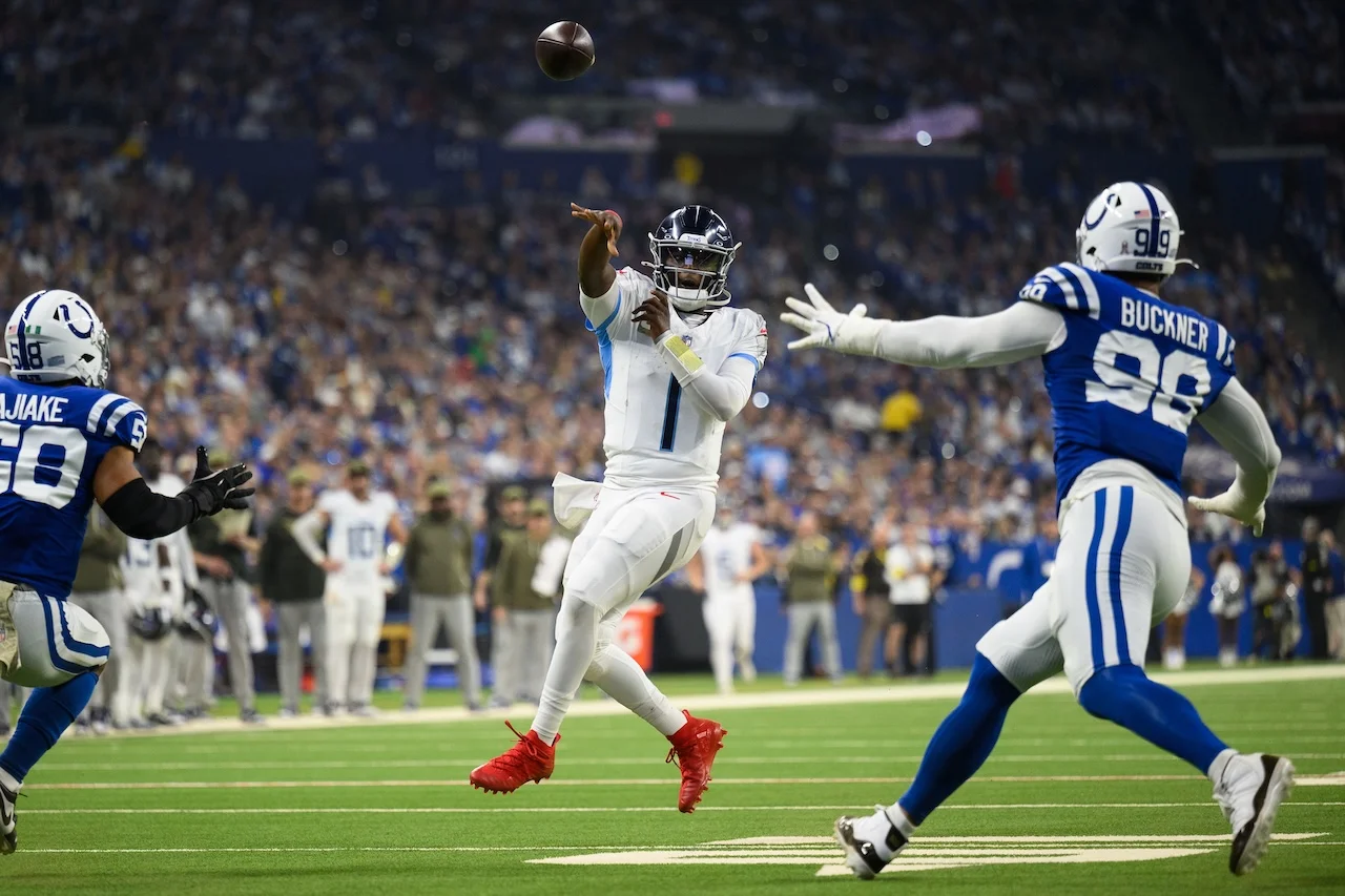 Tennessee Titans quarterback Cam Ward (1) throws the ball during an NFL football game against the Indianapolis Colts, Sunday, Oct. 26, 2025, in Indianapolis. (AP Photo/Zach Bolinger)