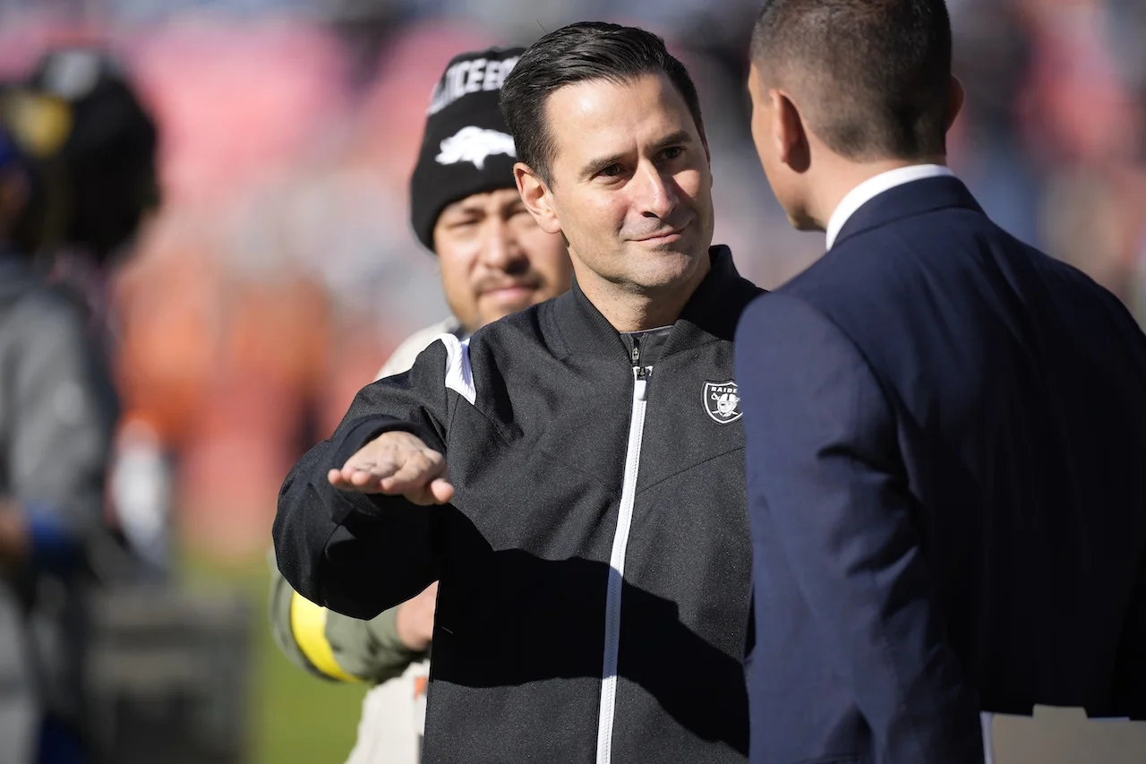 Dave Ziegler, general manager of the Las Vegas Raiders, chats in the first half of an NFL football game Sunday, Nov. 20, 2022, in Denver. (AP Photo/David Zalubowski)