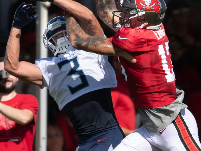 Tennessee Titans' Caleb Farley Defending A Pass
