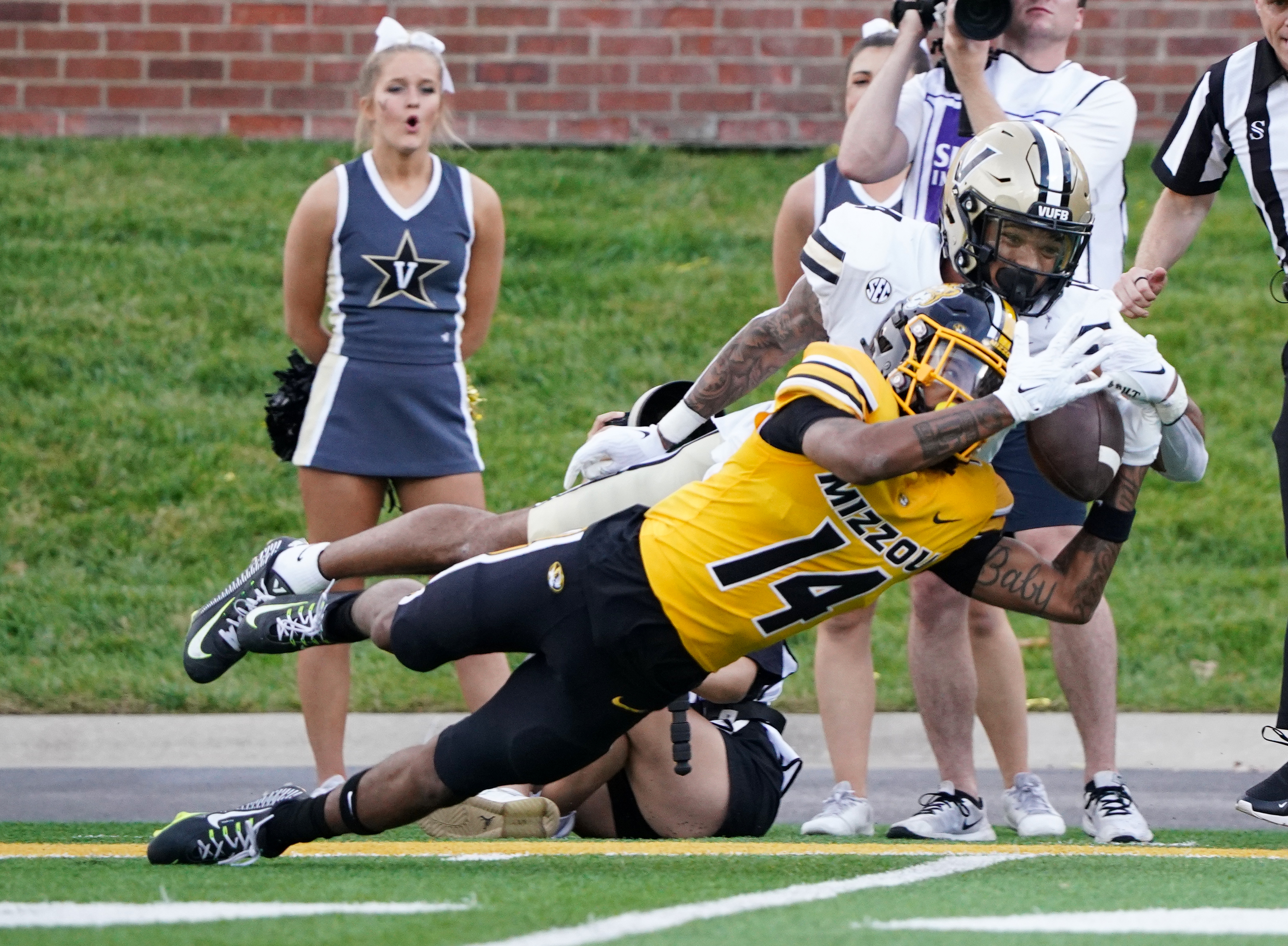 Oct 22, 2022; Columbia, Missouri, USA; Missouri Tigers defensive back Kris Abrams-Draine (14) breaks up a pass intended for Vanderbilt Commodores wide receiver Will Sheppard (14) during the first half of the game at Faurot Field at Memorial Stadium. Mandatory Credit: Denny Medley-USA TODAY Sports