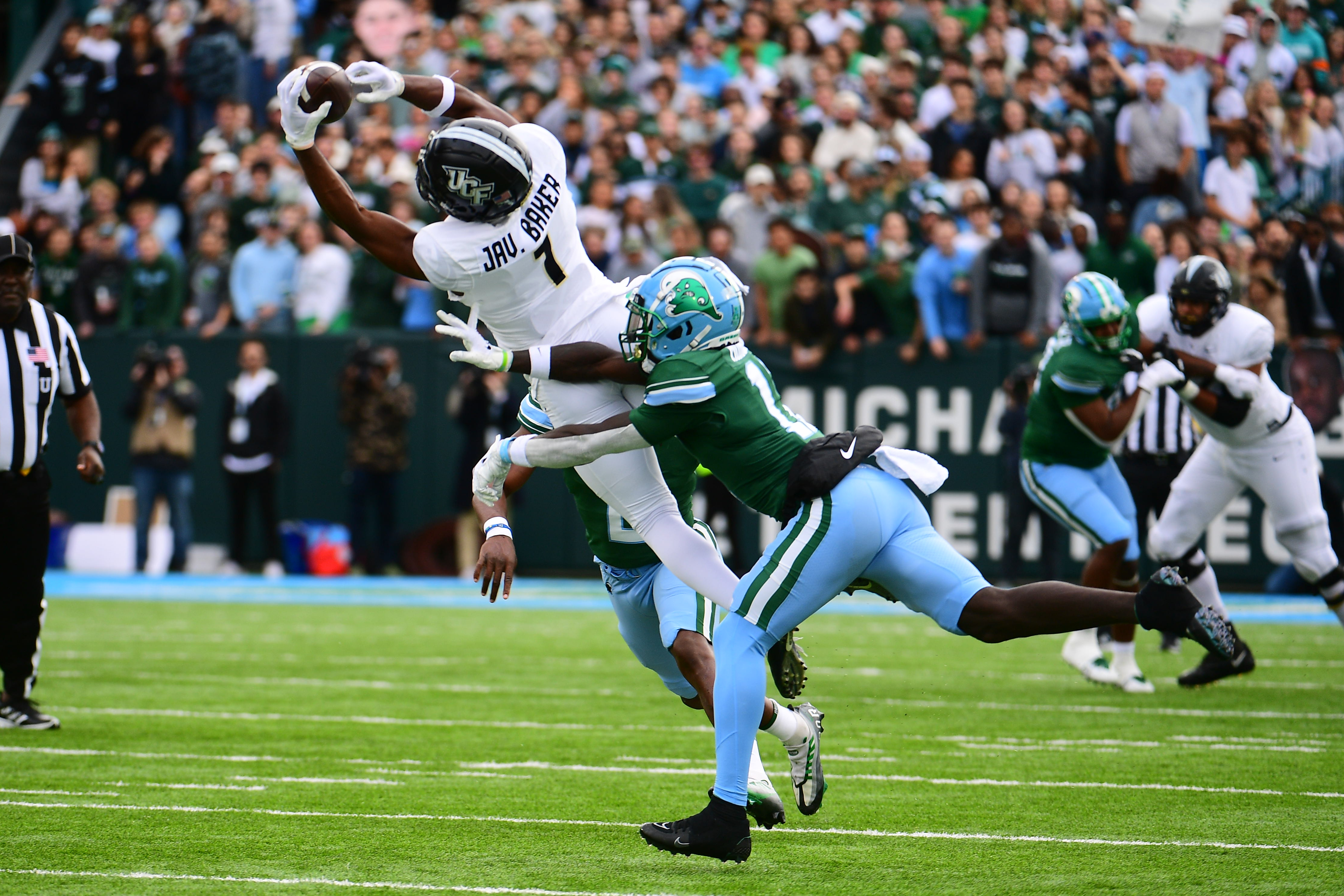 Nov 12, 2022; New Orleans, Louisiana, USA; UCF Knights wide receiver Javon Baker (1) receives a pass during the first quarter against the Tulane Green Wave at Yulman Stadium. Mandatory Credit: Rebecca Warren-USA TODAY Sports
