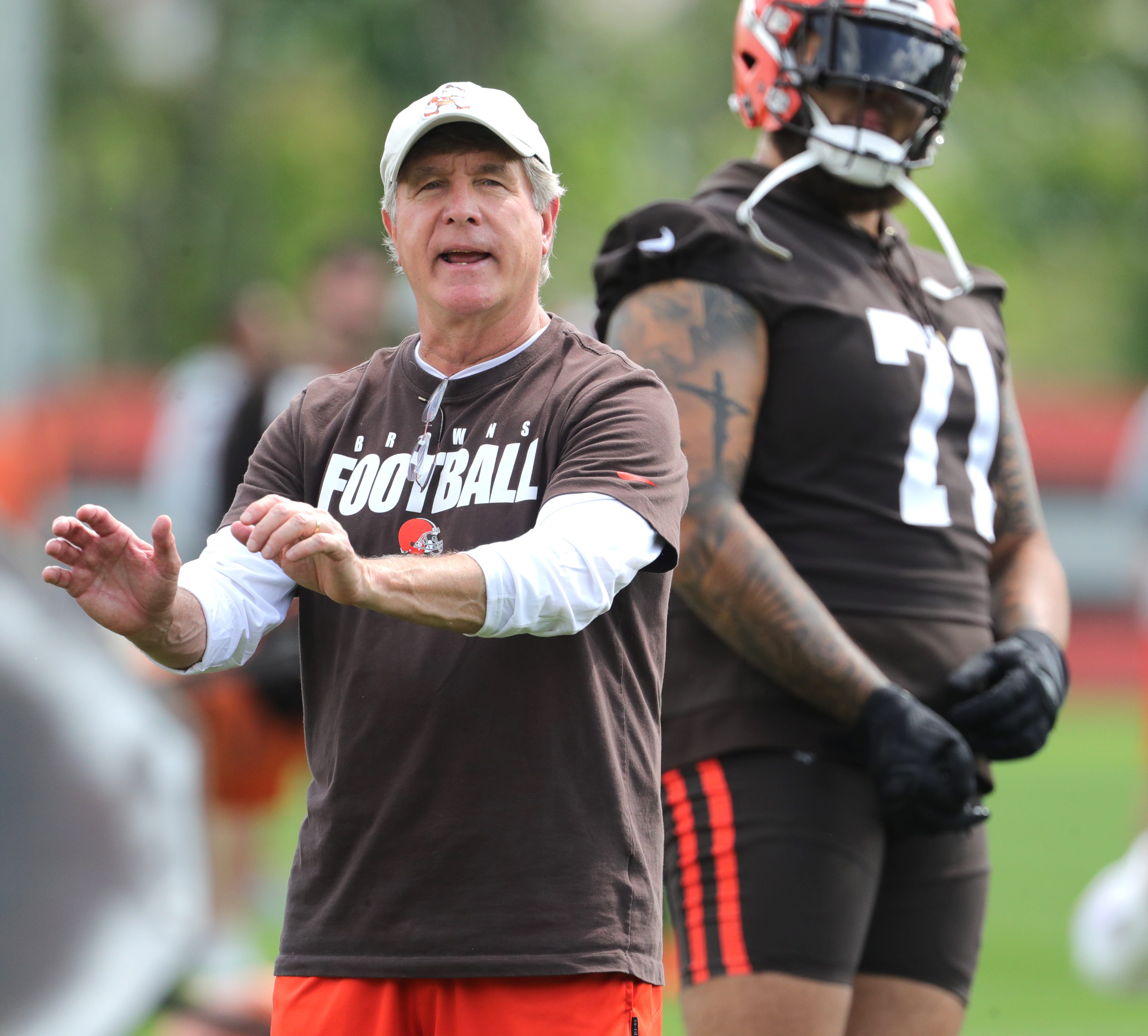 Cleveland Browns offensive line coach Bill Callahan works with the lineman during OTA workouts on Wednesday, June 8, 2022 in Berea.