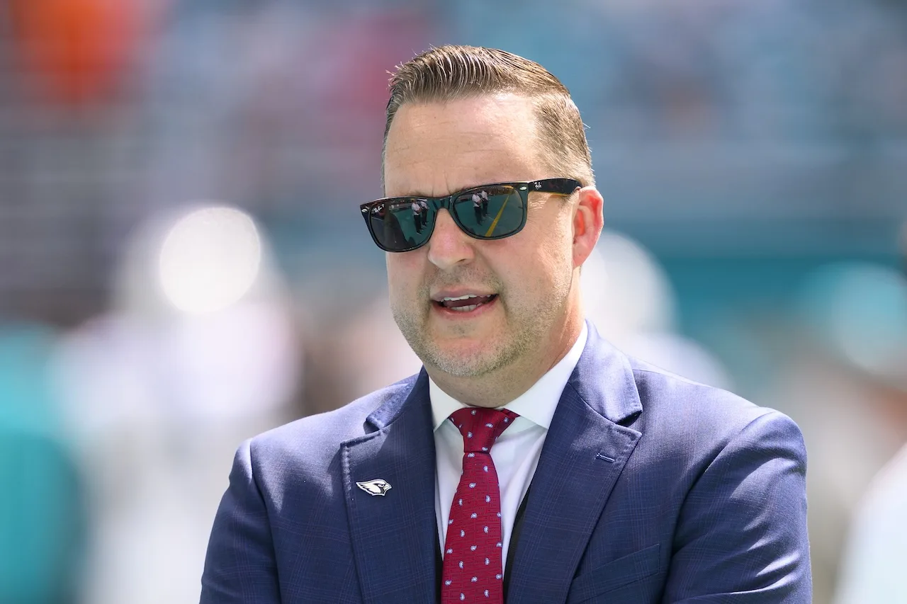Arizona Cardinals chief operating officer Jeremy Walls stands on the sidelines before an NFL football game against the Miami Dolphins, Sunday, Oct. 27, 2024, in Miami Gardens, Fla. (AP Photo/Doug Murray)