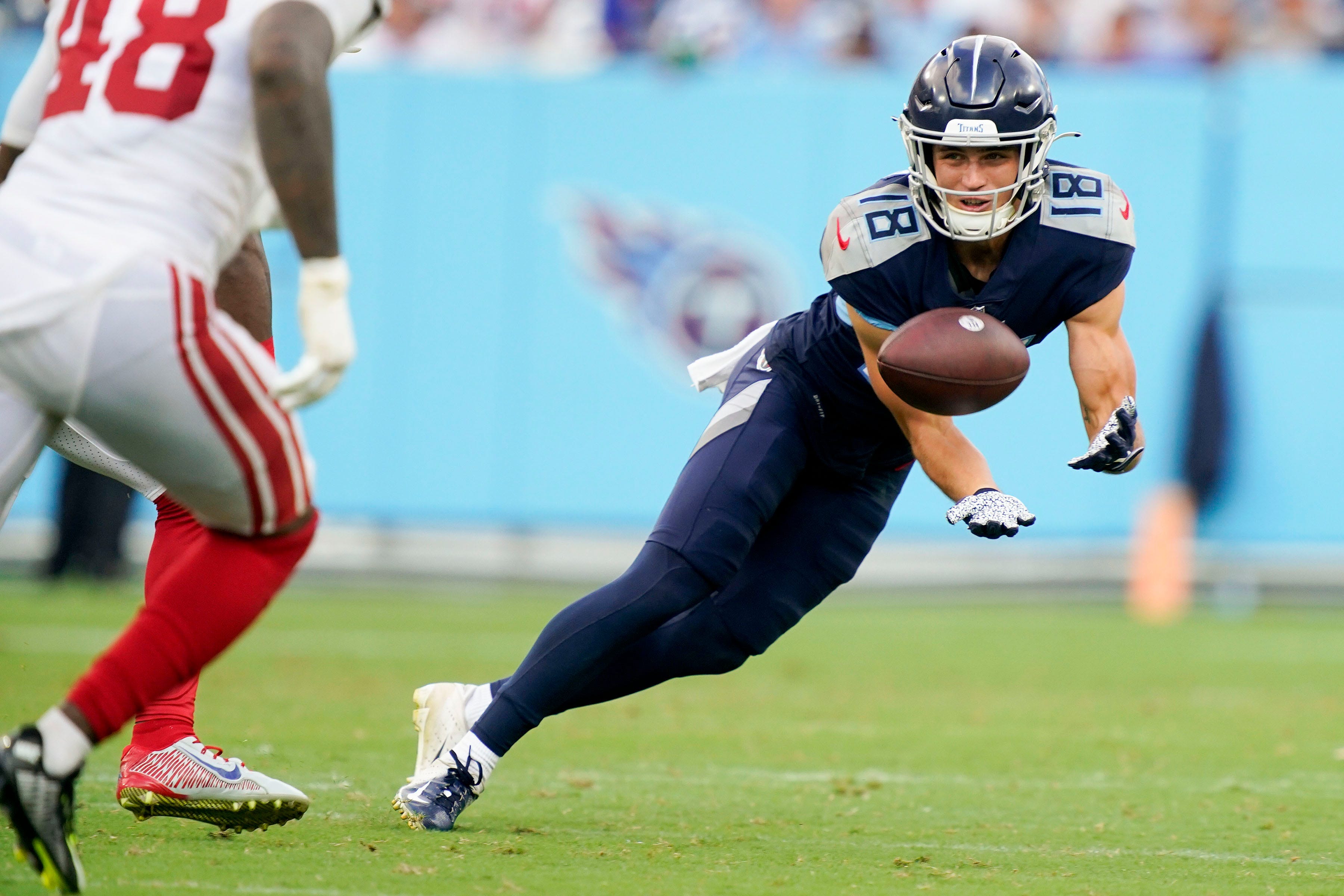 Titans wide receiver Kyle Philips pulls in a first-down catch during the third quarter against the New York Giants. Sept. 11, 2022.. Syndication The Tennessean