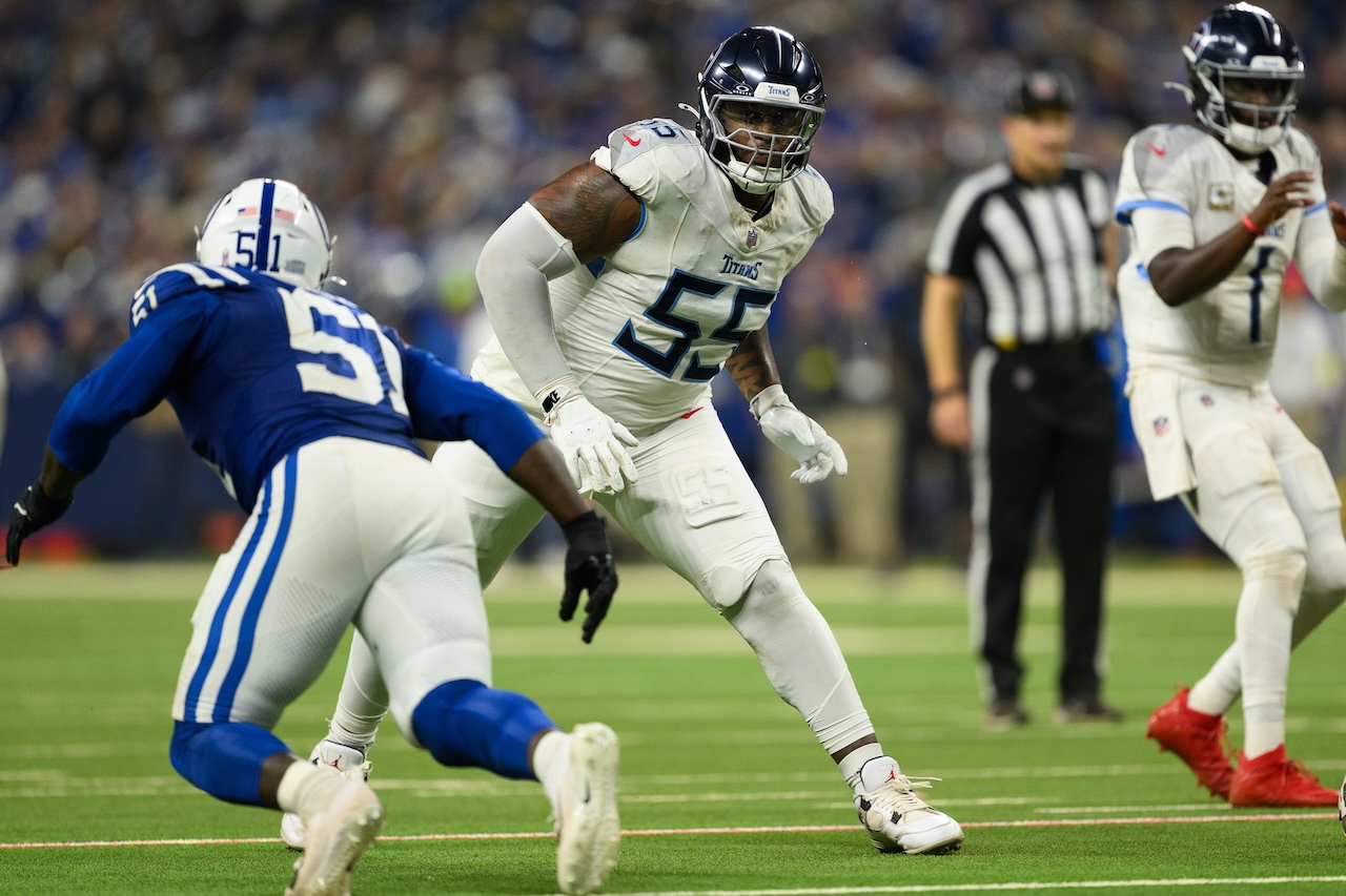  Tennessee Titans tackle JC Latham (55) blocks Indianapolis Colts defensive end Kwity Paye (51) during an NFL football game, Sunday, Oct. 26, 2025, in Indianapolis. (AP Photo/Zach Bolinger)