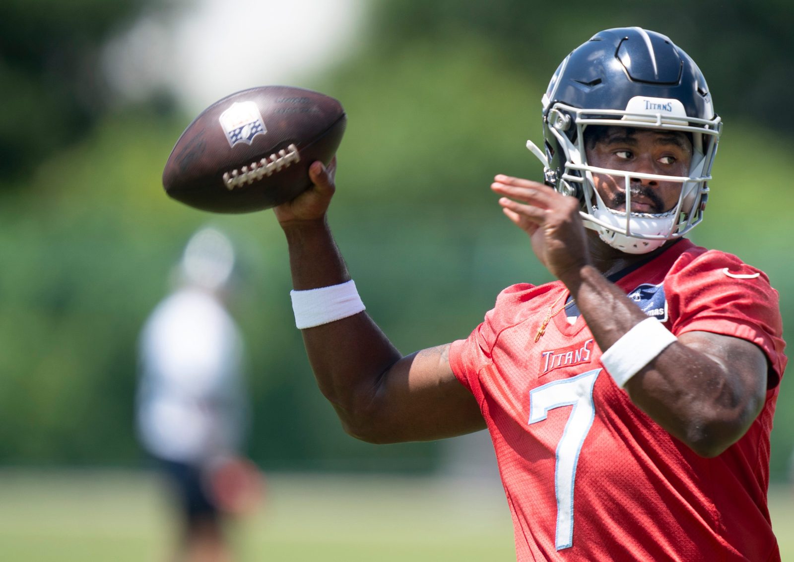 Quarterback Malik Willis (7) throws during the Tennessee Titans mandatory mini-camp at Ascension Saint Thomas Sports Park in Nashville, Tenn., Thursday, June 6, 2024.