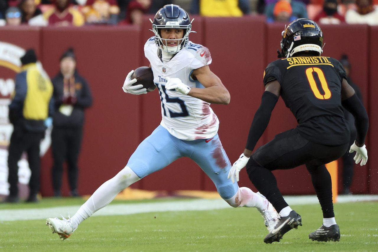 Tennessee Titans wide receiver Nick Westbrook-Ikhine (15) runs with the ball during an NFL football game against the Washington Commanders, Sunday, Dec. 1, 2024 in Landover, Md. (AP Photo/Daniel Kucin Jr.)