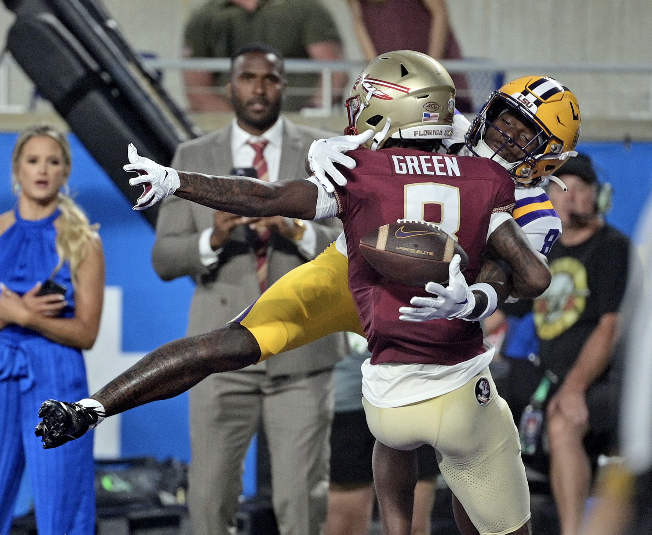 Sep 3, 2023; Orlando, Florida, USA; Florida State Seminoles defensive back Renardo Green (8) defends a pass intended for Louisiana State Tigers wide receiver Malik Nabers (8) during the first half at Camping World Stadium. Mandatory Credit: Melina Myers-USA TODAY Sports