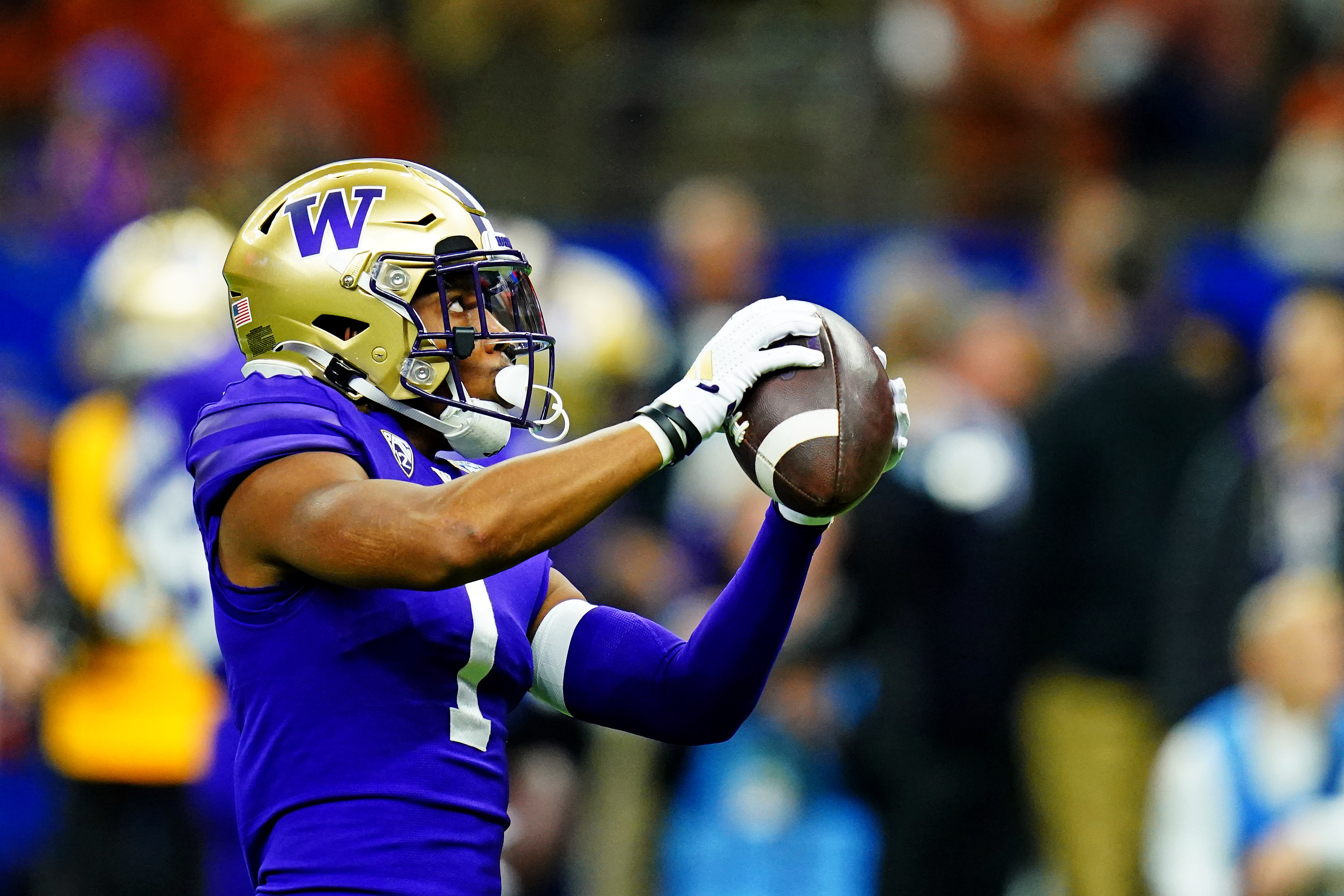 Jan 1, 2024; New Orleans, LA, USA; Washington Huskies wide receiver Rome Odunze (1) warms up before playing against the Texas Longhorns in the 2024 Sugar Bowl college football playoff semifinal game at Caesars Superdome. Mandatory Credit: John David Mercer-USA TODAY Sports
