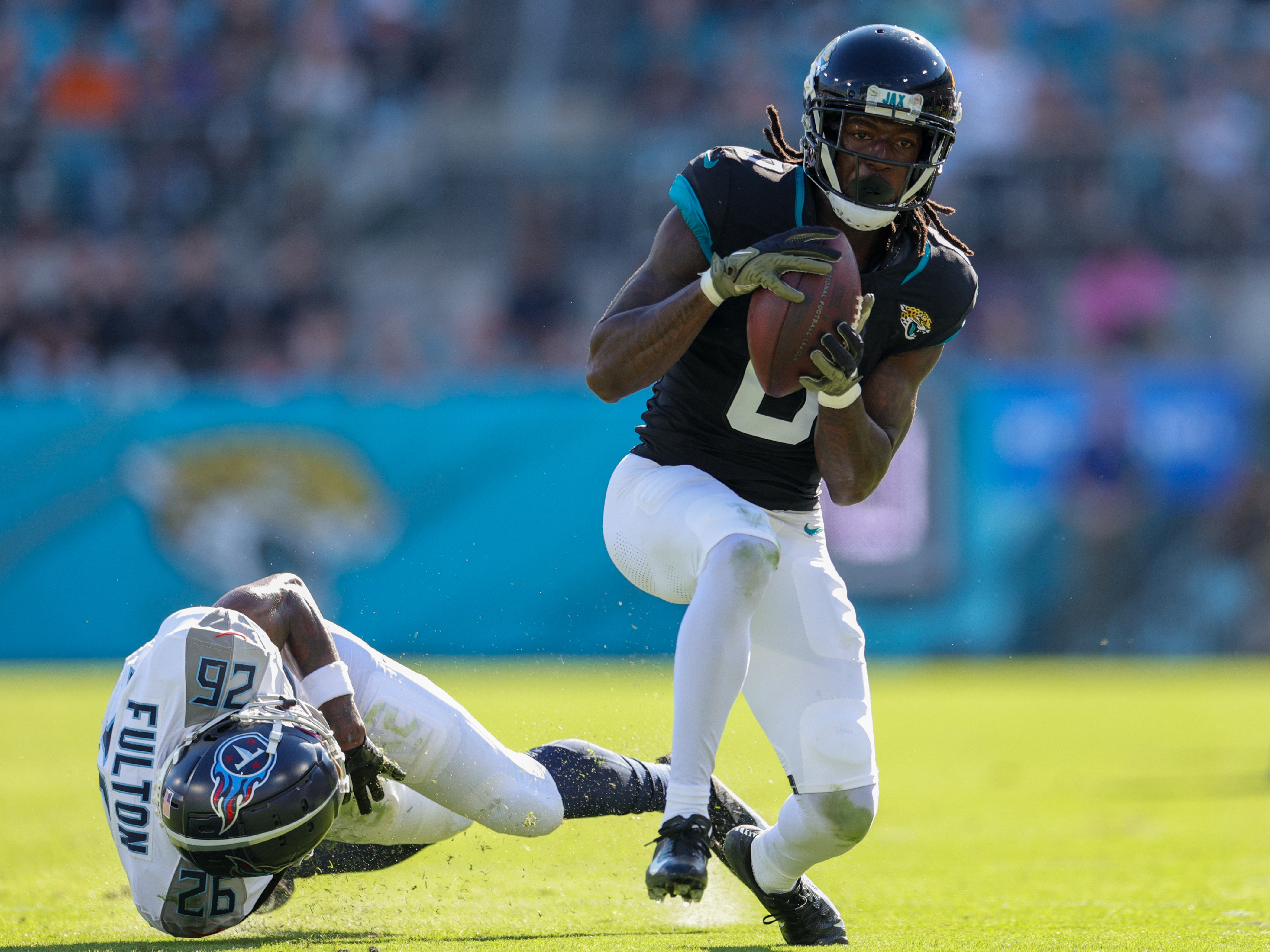 Nov 19, 2023; Jacksonville, Florida, USA; Jacksonville Jaguars wide receiver Calvin Ridley (0) catches a pass against the Tennessee Titans in the second quarter at EverBank Stadium. Mandatory Credit: Nathan Ray Seebeck-USA TODAY Sports