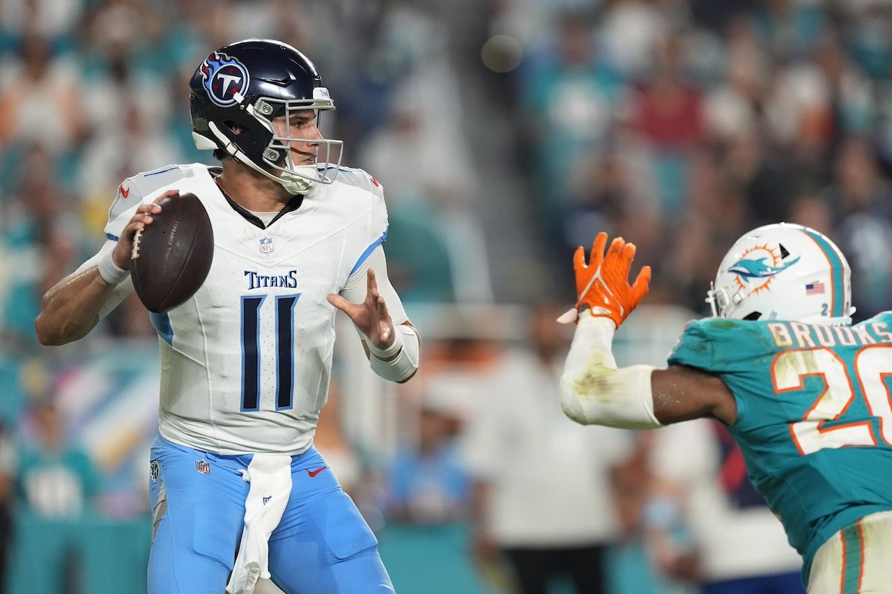 Tennessee Titans quarterback Mason Rudolph (11) aims a pass during the second half of an NFL football game against the Miami Dolphins, Monday, Sept. 30, 2024, in Miami Gardens, Fla. (AP Photo/Rebecca Blackwell)