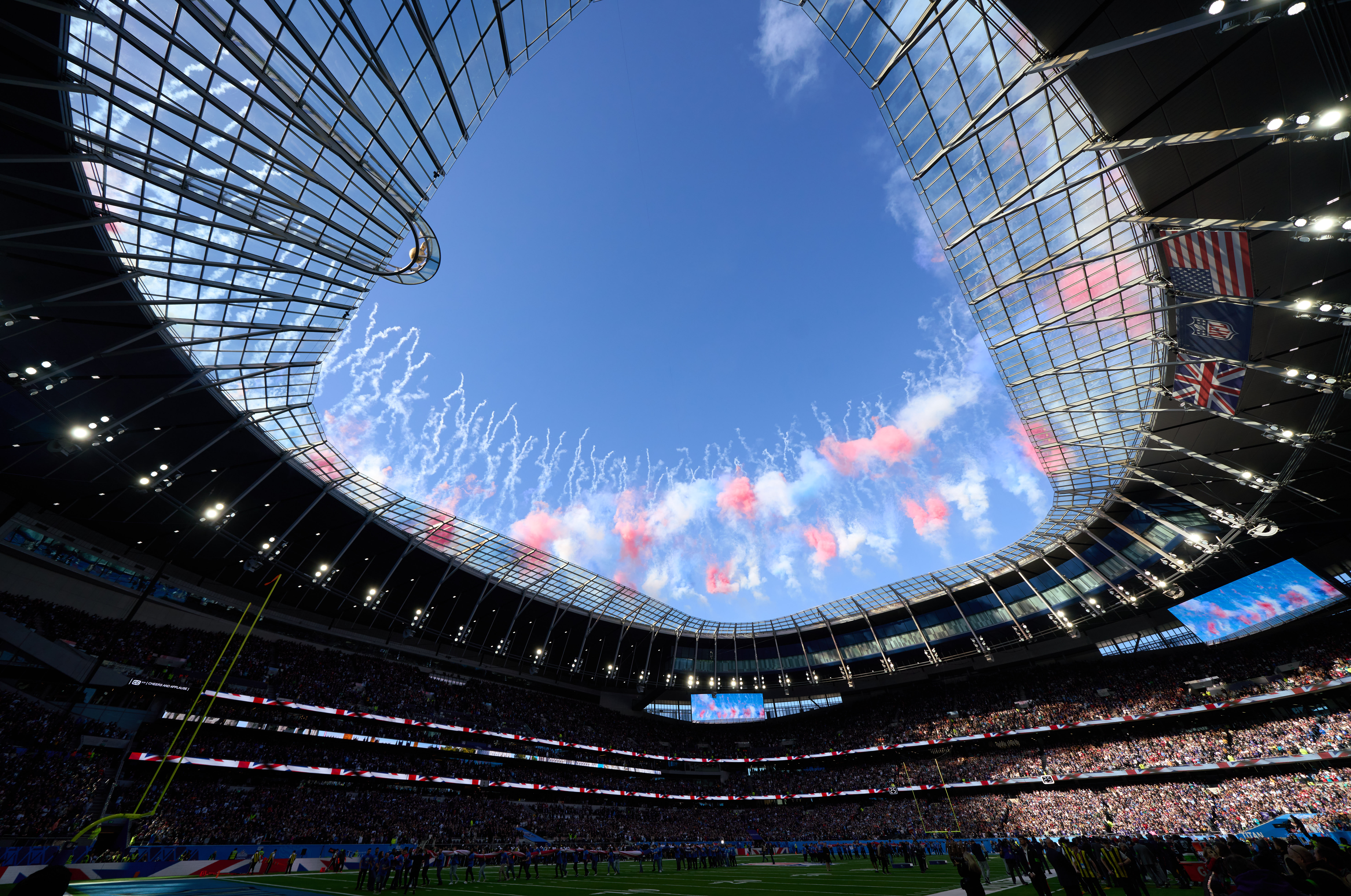 Oct 15, 2023; London, United Kingdom; Fireworks mark the start of the first half of an NFL International Series game at Tottenham Hotspur Stadium. Mandatory Credit: Peter van den Berg-USA TODAY Sports