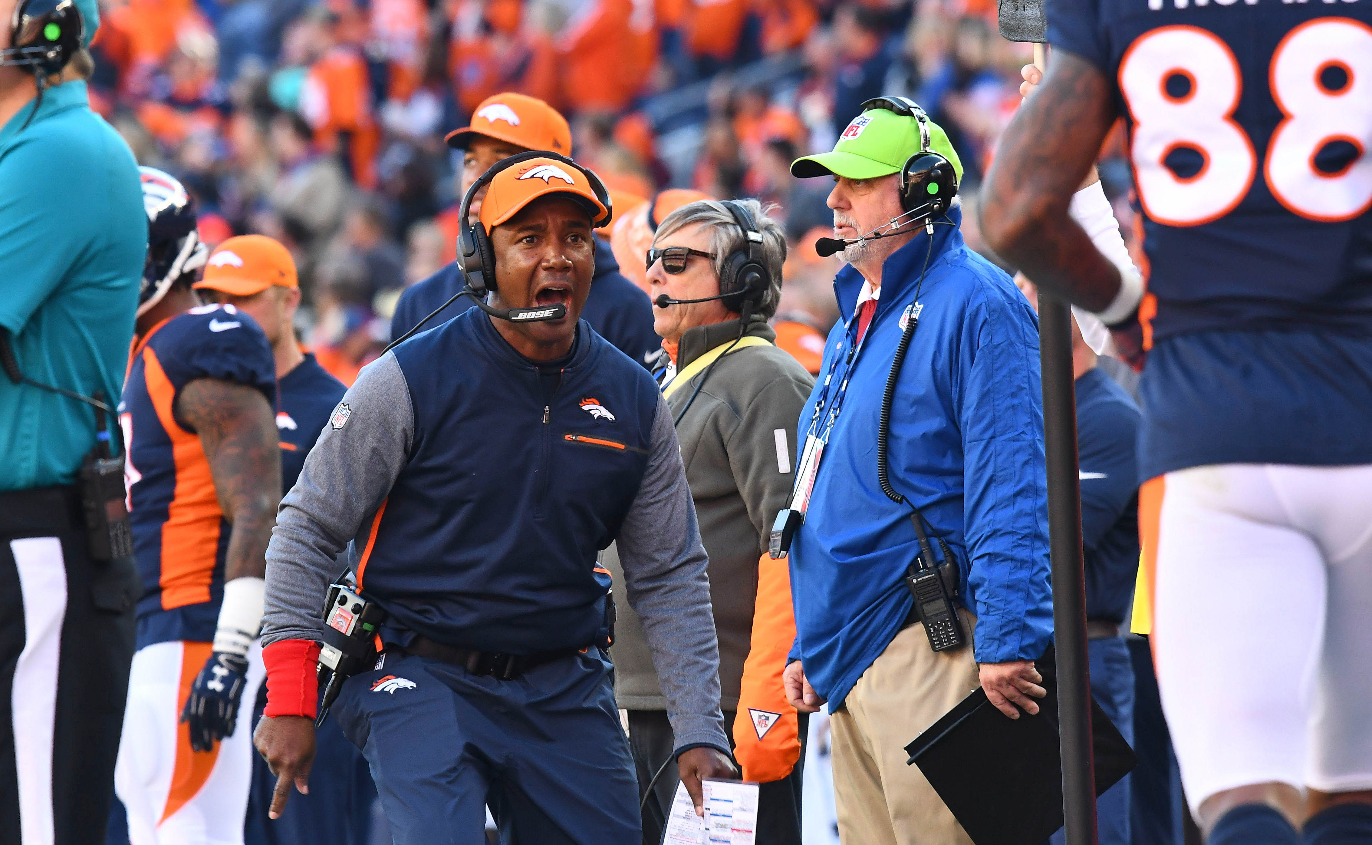 Dec 10, 2017; Denver, CO, USA; Denver Broncos wide receiver coach Tyke Tolbert reacts in the first half against the New York Jets at Sports Authority Field at Mile High. Mandatory Credit: Ron Chenoy-USA TODAY Sports